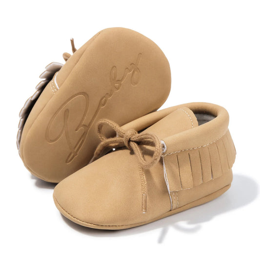 Mocassins bébé souple Sobabys beige avec franges et lacets pour une meilleure tenue