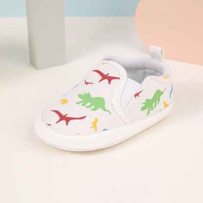Chaussures slip-on bébé avec motifs de dinosaures colorés pour un style amusant et confortable